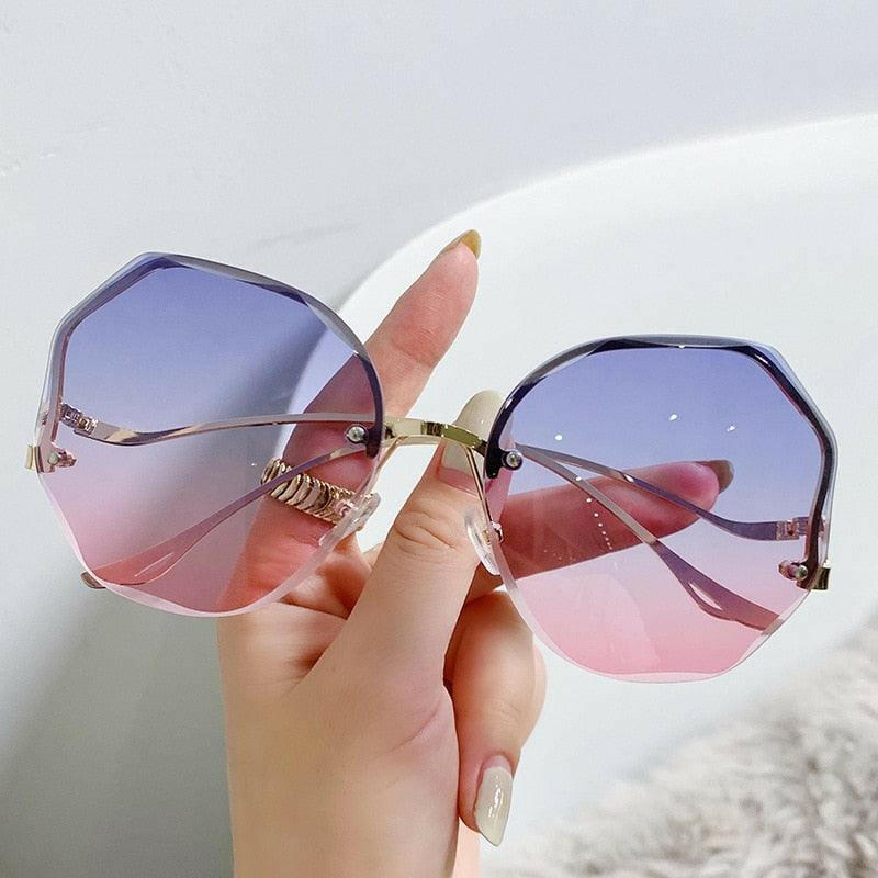 Stylish Curved Rimless Sunnies - The Nichole Collection