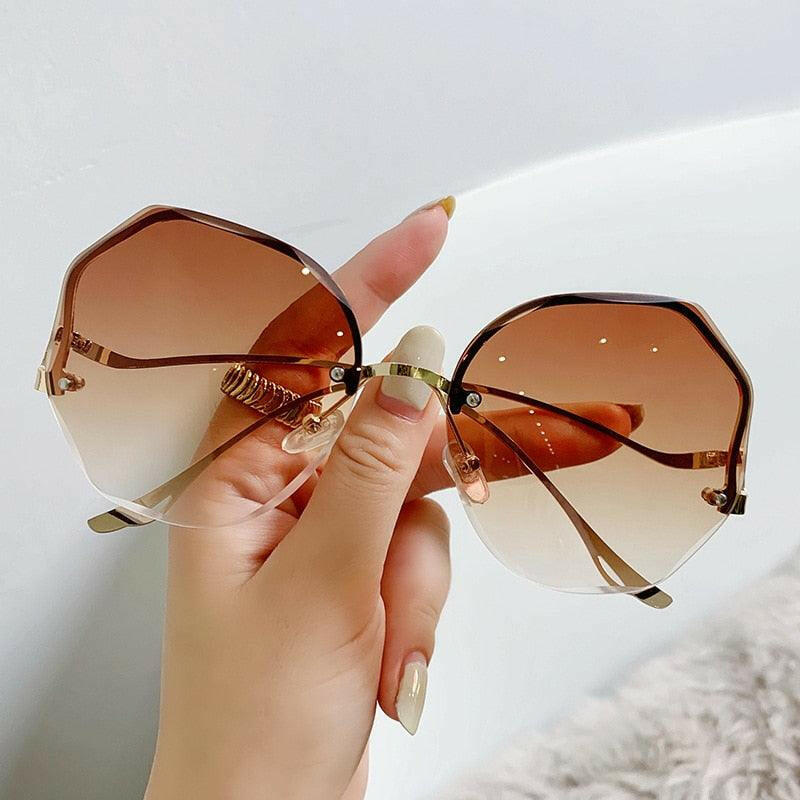 Stylish Curved Rimless Sunnies - The Nichole Collection