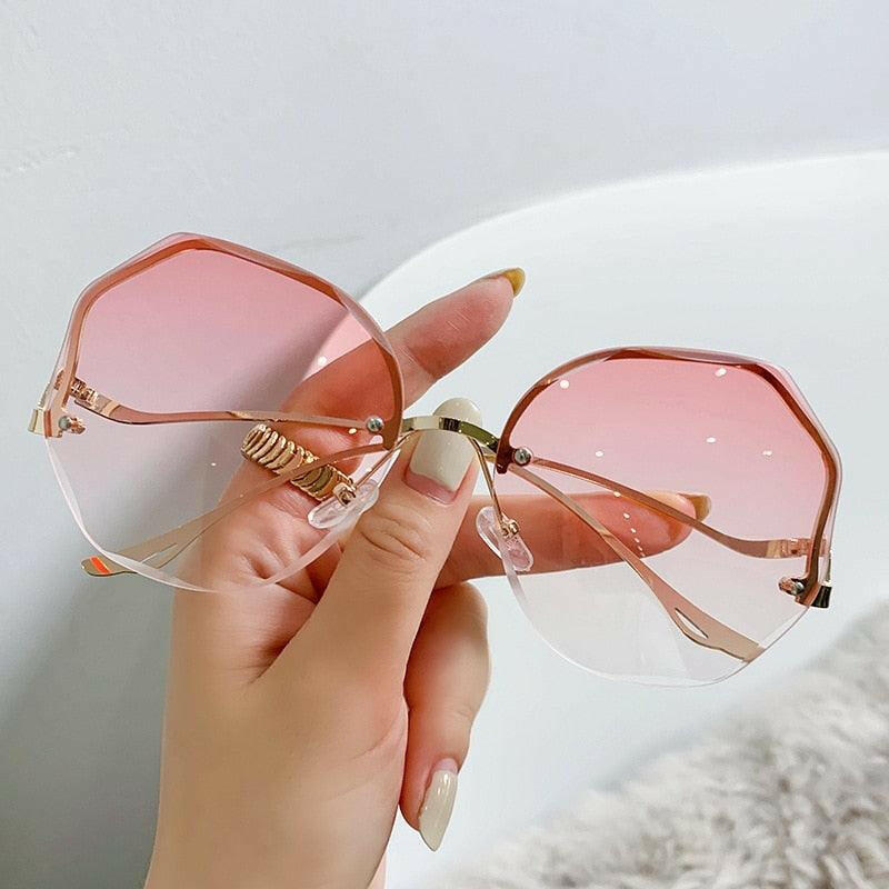 Stylish Curved Rimless Sunnies - The Nichole Collection