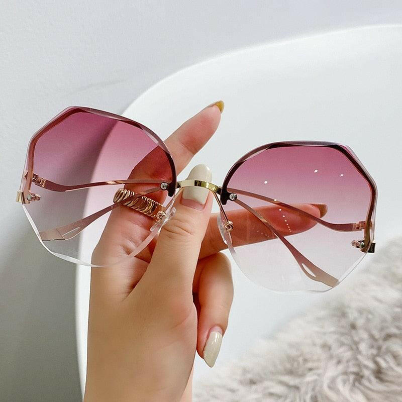 Stylish Curved Rimless Sunnies - The Nichole Collection